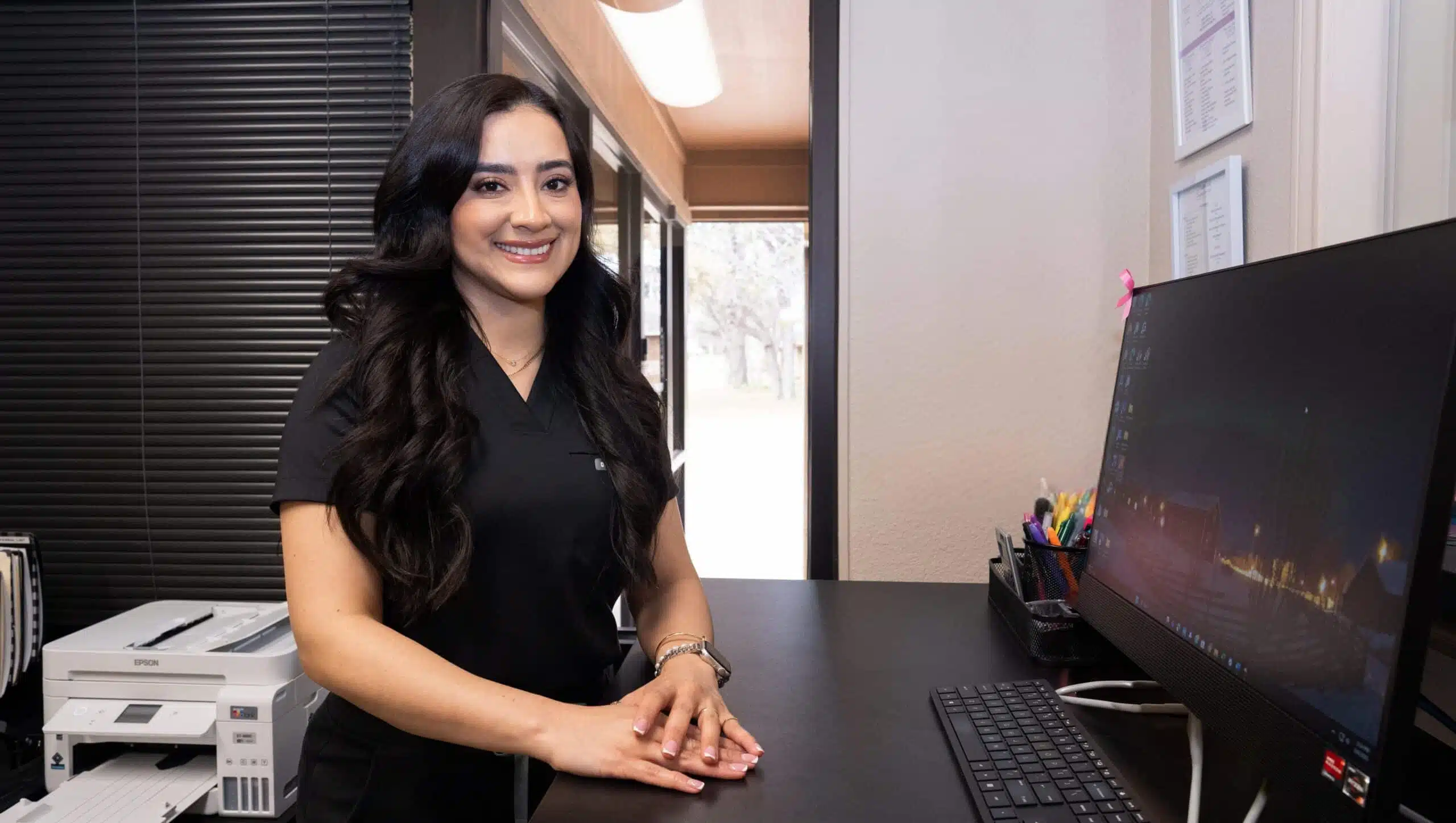 debora from ultrasound imaging concepts at the reception desk