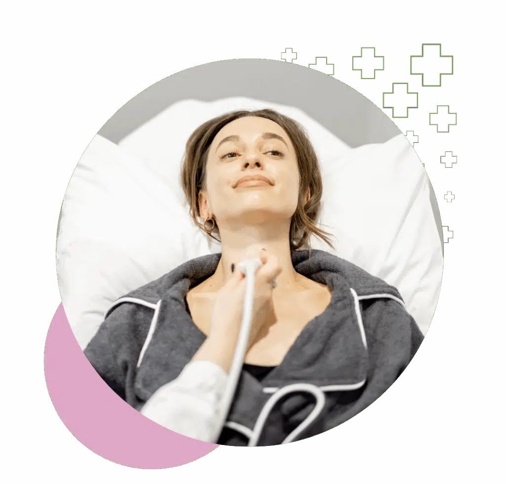 Patient relaxed on a medical bed while receiving a thyroid ultrasound scan in a clinic.